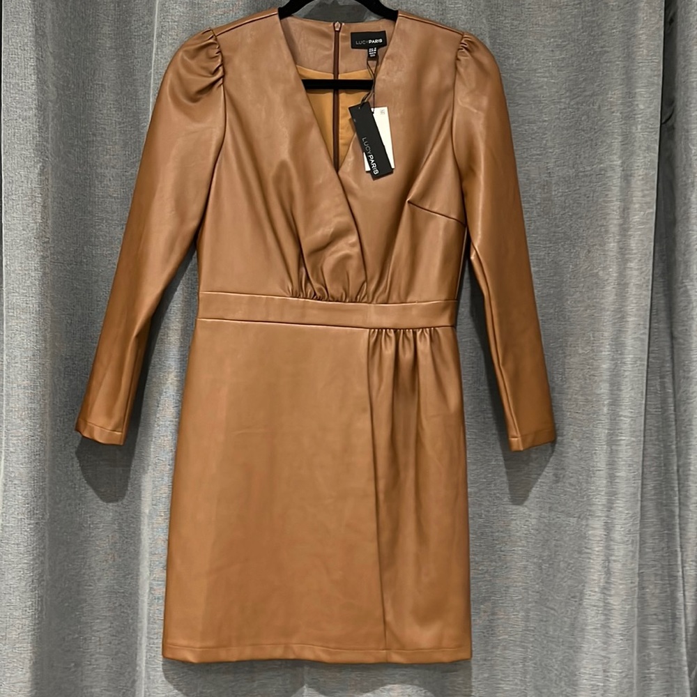 Bloomingdales. Faux Leather dress. Great to wear to a concert! 😄😁